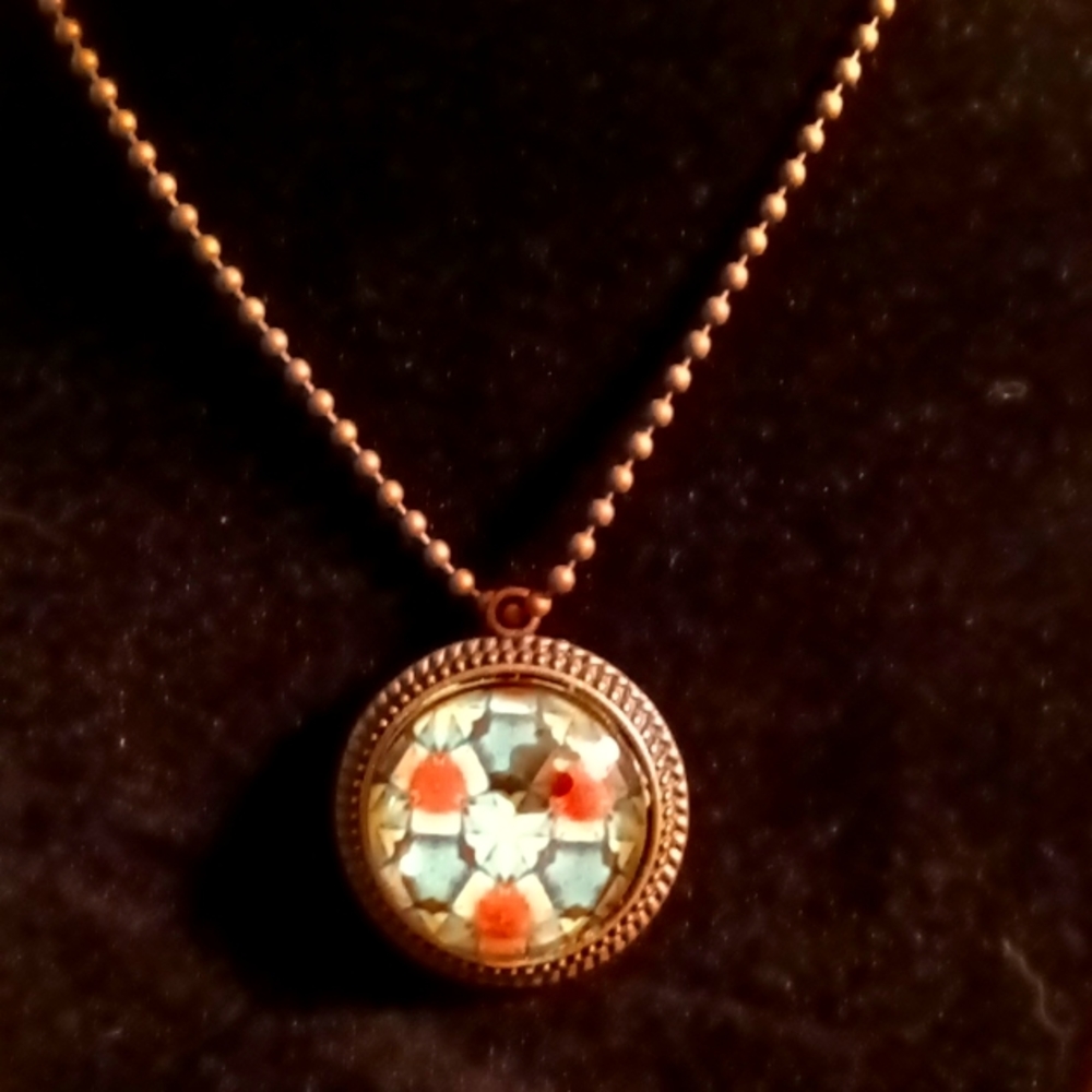 Handmade Round glass pendant necklace geometric shapes in turquoise red cream.